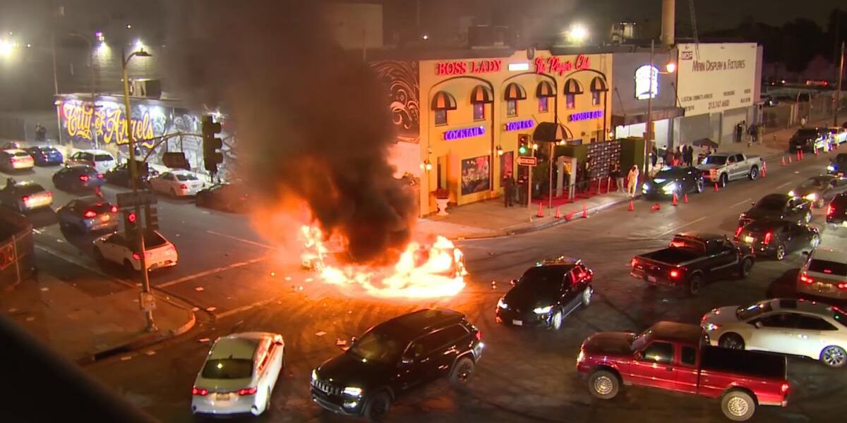 Cars Set Ablaze and Dealership Damaged in Two Street Takeovers in Overnight Chaos in Los Angeles (1)