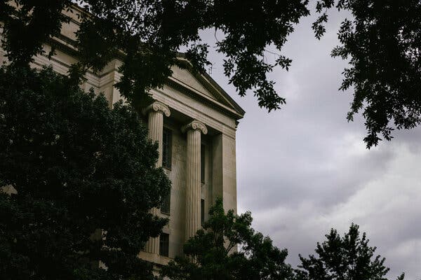 Justice Dept. Officials File Suit, Saying They Were Dismissed Unlawfully