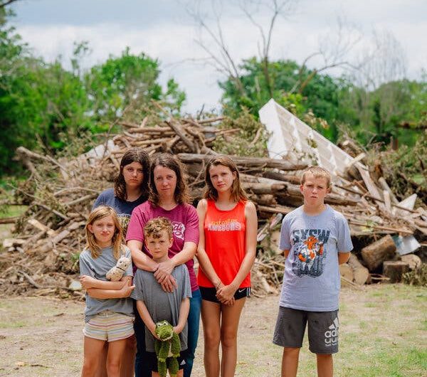 A Mother of Five Survived the Flood to Return to a Cabin in Ruins